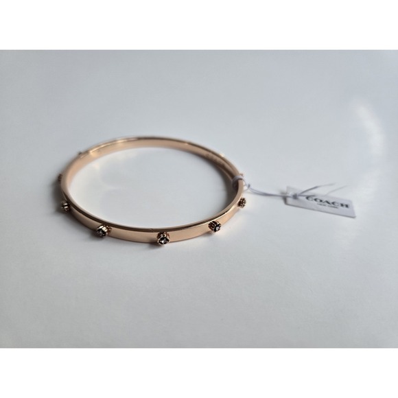 Coach Jewelry - NWT Coach tea rose gold-tone bangle bracelet - crystal studs, 2.75" diameter